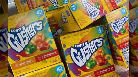 The word G ushers, no longer accompanied by the word fruit , is instead joined by accenting squirt marks squelching out of the puffy font, and the rainbow puddles in the background are reminiscent of. . Gushers aux fruits meaning